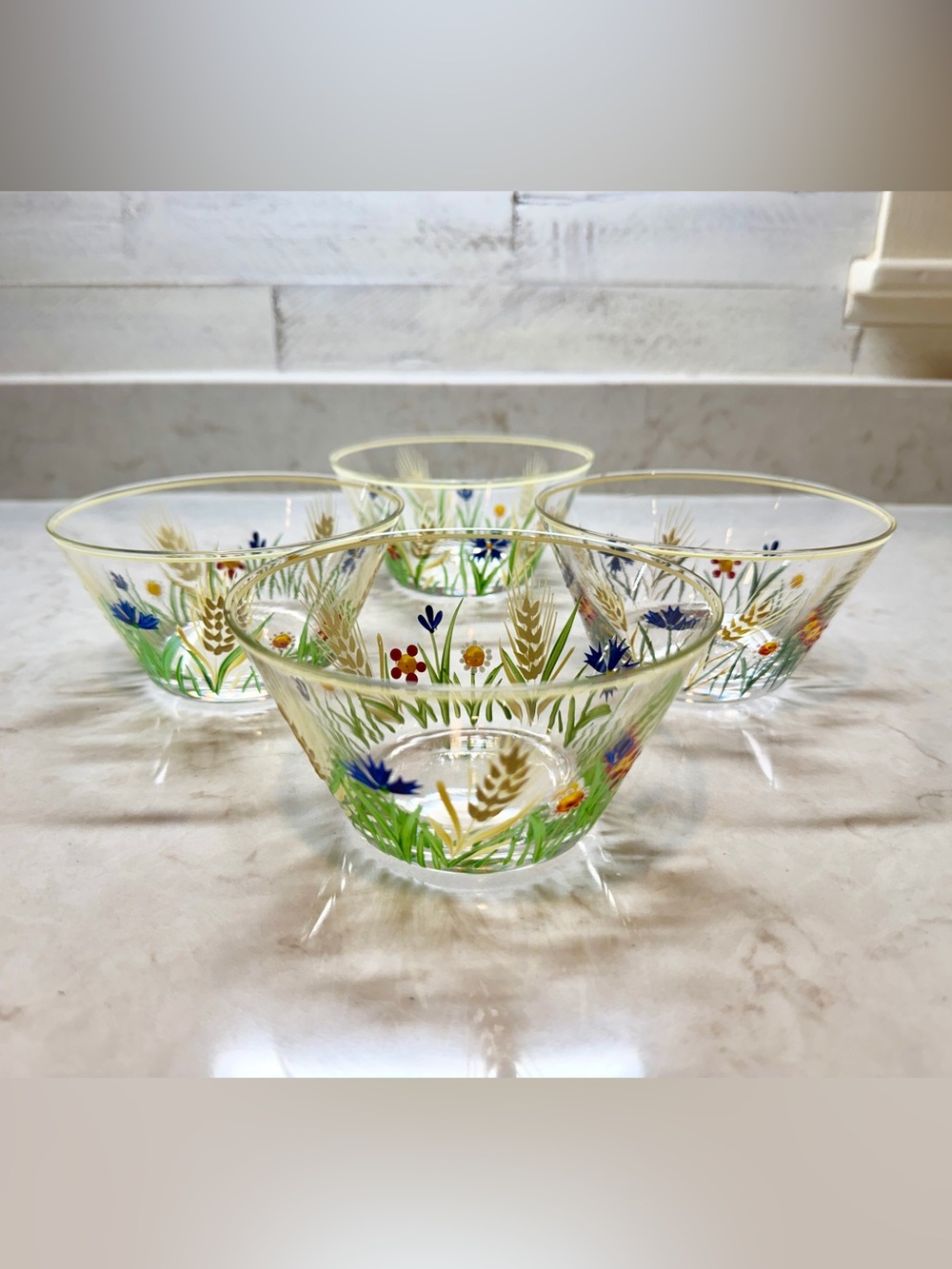 VINTAGE, CLEAR GLASS BOWLS WITH A COLORFUL, HAND-PAINTED DESIGN & YELLOW TRIM.
